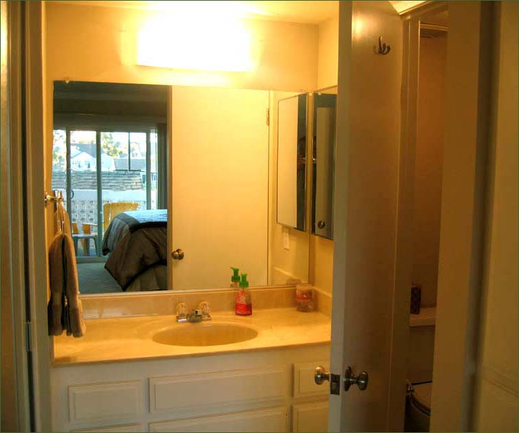 The full bathroom is in the hallway for easy access from the living areas and the bedroom.